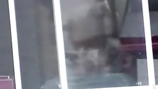 Babe flashed her nude boobs when closing the window