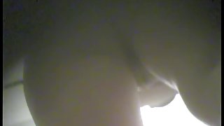 Sexy naked bottom of hot lady voyeured in changing room