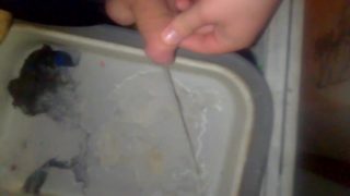 Man piss in dirty sink