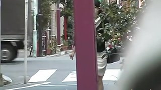 Asian girl wearing a white skirt featured in a sharking vid