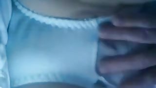 Maggie playing with a toy