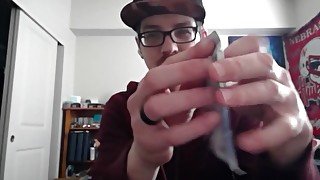 Cute Nerd Opening a Pack of Magic The Gathering Cards