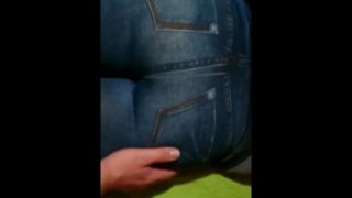 Touching her big ass in a jeans legging
