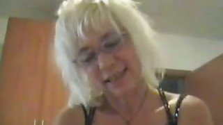 Filthy mature woman with big knockers sucks my dick until I cum