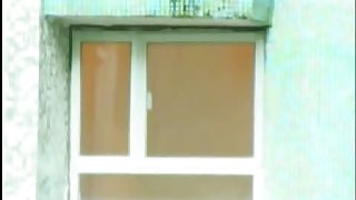 A horny voyeur loves filming hot girls thru the window.