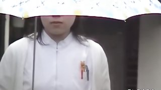 Rain and no panties sharking for a hot and sexy Asian girl