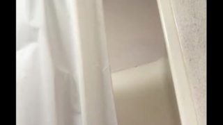 Lane talking a shower