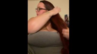 Brushing my long hair, then shows huge boobs with hair at the end