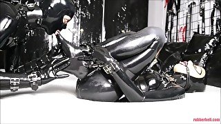 Bound rubber girl gets fucked #2: pleasure with foreplay