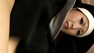 Horny Japanese nun Rika Sakurai giving blowjob on cam