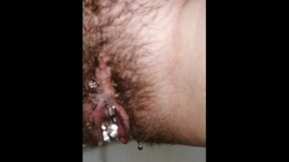 Hairy pussy piss closeup