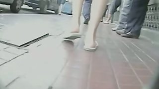 Sleek milf upskirt voyeur video on the street