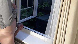 Horny and daring straight cock hung masturbates in full view of neighbours