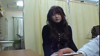 Lovely Asian babe gets her cunt checked during medical exam