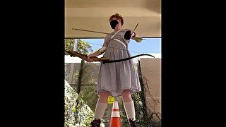 Archery practice in a sundress and boots 🖤