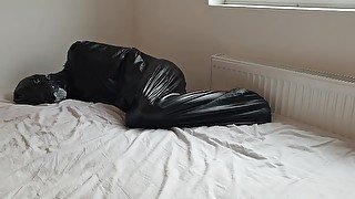 Submissive Locked in Bondage Bag and Gagged in Bondage Hood