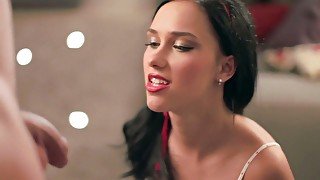 Beautiful brunette gives sensual blowjob standing on knees