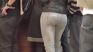 A rich ass in tight jeans in this spy cam video