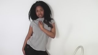 Ebony chick with curly hair is up for all sorts kinky erotic games