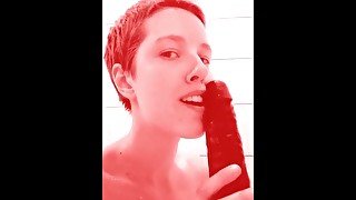 Playing, teasing, sucking, black dildo shower time.