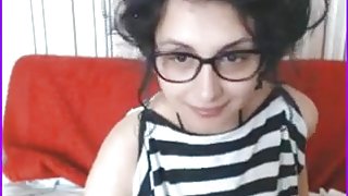 Shy beautiful girl rubs her wet clit