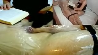 Femdom Handjob Tease in Plastic Wrap While Reading