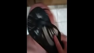 Licking dirty flip flops