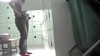 Charming Asian caught changing in the locker room