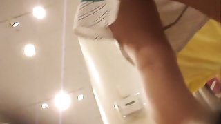 Hottie from changing room sex video flashes pantieless butt