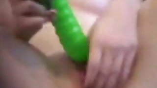 I spy on my naughty pale girlfriend teasing herself with dildo on sofa