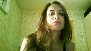 Russian non-professional stripping in her bedroom