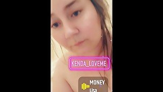 Tease in bathtub with bubbles