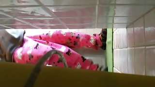 Dorm coed taking a piss and showing her teen pussy