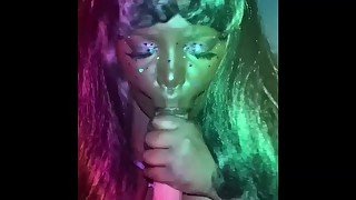 ebony giving head to a big dildo