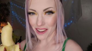 Baby playing with a Banana