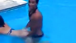 Latina girl couple fucks in the swimming pool and the shower