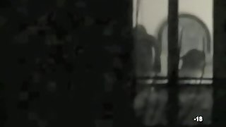 Voyeur thru window black-and-white neighbor video