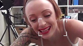 Red haired inked slut Paige Fox gives solid blowjob to her freaky 4 eyed BF on camera