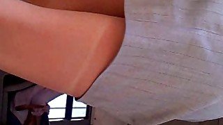 Short gray skirt on the bus