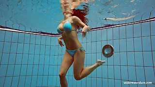 Underwater striptease by sex-appeal swimmer Deniska