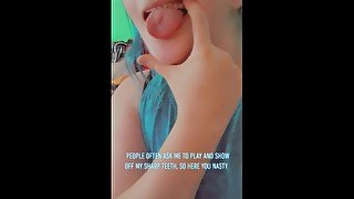 Playing with my sharp sharp teeth. (Tongue piercing(