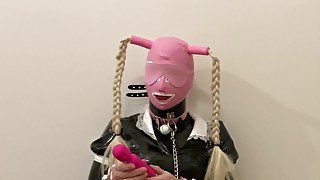 Sissymaid play with magic wand in latex