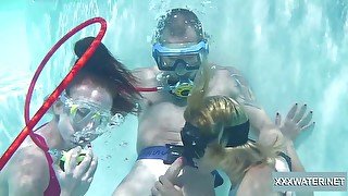 Babes take turns sucking dick underwater and they are so adventurous