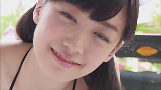 Cute Japanese teen shows her goods