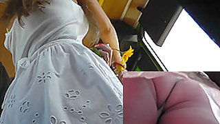 Raven-haired chick in thong caught by cameraman