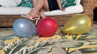 Sexy Foot Goddess pops balloons with heels
