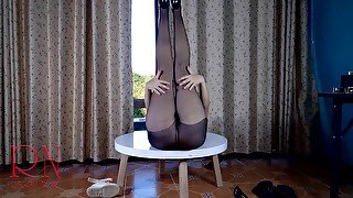Nice lady in pantyhose and heels. Striptease at the round table 3