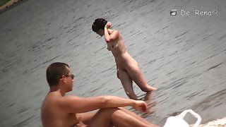 Voyeur beach shots of amateur people sunbathing nude