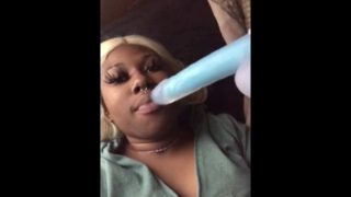 Hot Tattooed Ebony 18yr old sucks on a toy real wet and nasty 