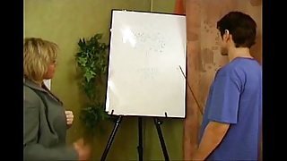 Russian mature teacher fucks young student in her classroom